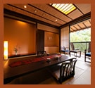 A modern Japanese-Western style room featuring a bath with a viewかすみ・朝霧